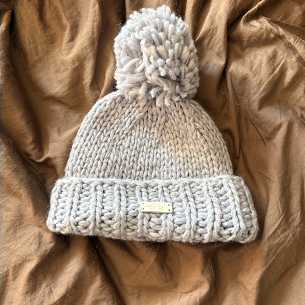 The North Face Chunky Cable Knit Beanie Hat with a Pom Pom Greyish Blue